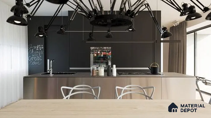 A kitchen with marble counter tops and stainless steel appliances on the wall, along with hanging lights hanging from the ceiling over the ceiling over the wall next to an island in front of a wooden floor and white